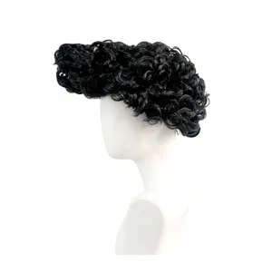 Men black curly synthetic wig detail shot, short voluminous retro styling hairpiece.