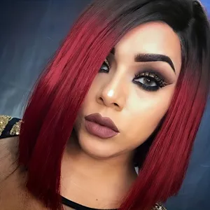 Fashionable black and red ombre short straight wig with center part for women daily wear.