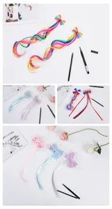 Detailed view of colorful children hair extensions, rainbow hair clips, and bowknot ponytails.