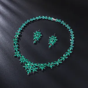 Elegant green crystal leaf necklace earrings set for bridal wedding party evening gown wear.
