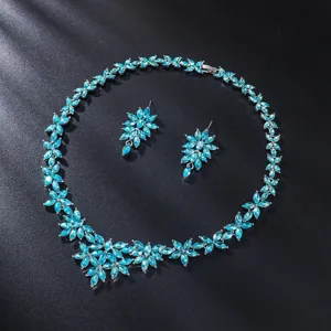 Blue crystal flower necklace and earrings set, elegant bridal jewelry for evening party.