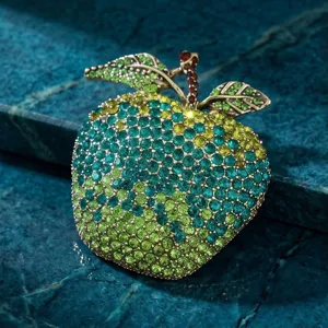 Rhinestone gradient apple brooch detail, sparkling crystal fruit pin for women's fashion.