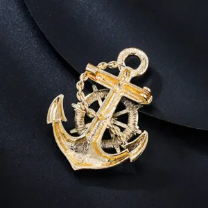 Detailed view of the gold anchor brooch pin mechanism, showing quality alloy craftsmanship.