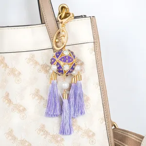 Chinese style rhinestone ball tassel keychain metal charm for car keys and handbag pendant.