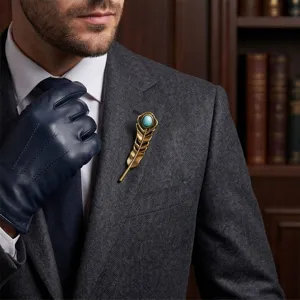 Vintage gold feather brooch with turquoise stone, elegant suit lapel accessory for men women.