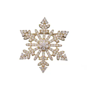 Broche flocon de neige en cristal de luxe pour femme, elegante epingle de costume doree.