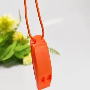 Orange emergency survival whistle with reflective lanyard, ideal for outdoor camping and sports.
