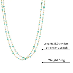 Green beaded double layer necklace with gold accents, elegant clavicle chain jewelry item.