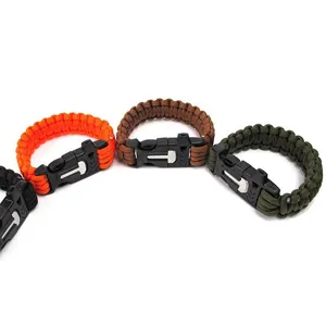 Bracelet de survie en paracorde 7 brins avec sifflet et pierre à feu pour camping extérieur.