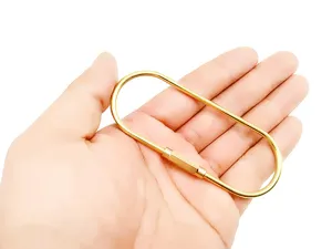 Solid brass oval screw lock keyring EDC pocket tool for car keys outdoor hanging use.