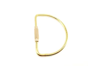 Brass D-ring keychain shackle with screw lock connector, durable metal EDC gear for keys and bags.