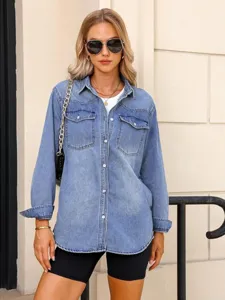 Close-up detail view of the classic blue denim long sleeve shirt showcasing front button closure.