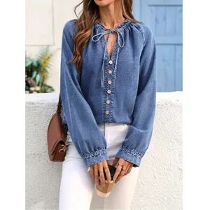 Plus size casual denim top for women with V-neck, drawstring and front button details.