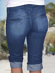 Women stretch slim casual cuffed denim capris shorts detail view showing back fit.