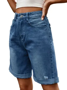Women high-waisted denim shorts with rolled cuffs and classic wash. Casual summer wear.