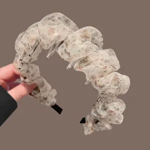 Floral mesh padded headband for women, stylish floral hair hoop with teeth design.