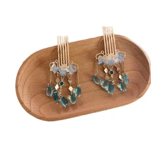 Traditional Chinese Hanfu hair comb set with blue butterfly and crystal tassel drops.