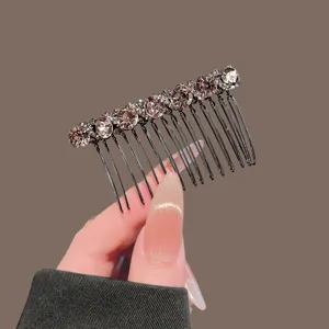 Sparkling rhinestone hair comb for women, elegant black metal crystal insert comb for styling.