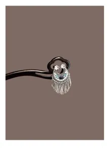 Close-up detail of the vintage Chinese crescent tassel wooden hairpin with intricate beads.
