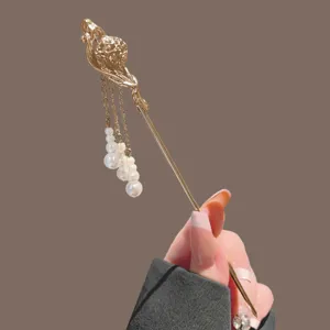 Vintage gold-plated hair stick with pearl tassels, elegant Chinese style hairpin accessory.