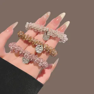 Exquis ensemble d'attaches de cheveux en strass perlé, corde élastique stylée pour coiffure.