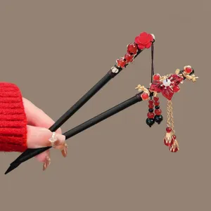 Chinese style wooden hair stick with red tassel and floral accents for women hanfu accessory