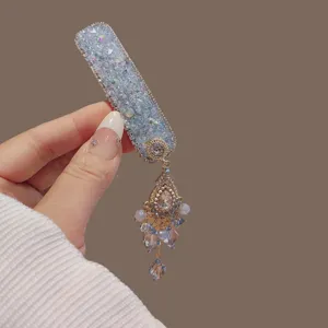 Elegante fermaglio per capelli con nappa di cristallo per donna, forcina strass frangia chic.
