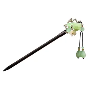New Chinese style wooden hair stick with green floral and bead drop tassel for Hanfu styling.