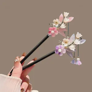 Vintage Chinese style floral hair sticks with elegant tassels, perfect for traditional hanfu.