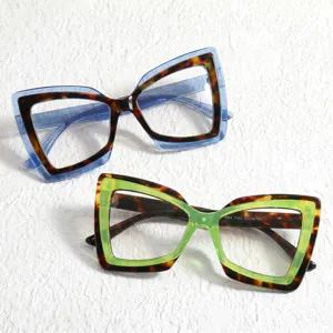 Oversized cat-eye butterfly reading glasses with color-blocking tortoiseshell frames.