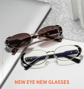 Detailed close-up view of trendy retro oval metal sunglasses and clear glasses with chic frames.