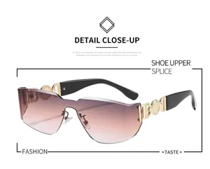 Lunettes de soleil sans monture tendance avec verres dégradés et détails métalliques.