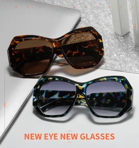 Gafas de sol de ojo de gato irregulares y elegantes con montura de carey para mujeres.