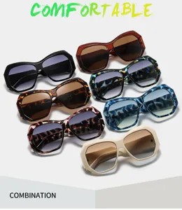 Gafas de sol irregulares de moda para mujer, estilo ojo de gato grande con monturas coloridas.