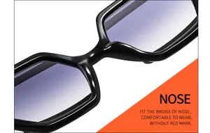 Close-up detail of irregular black sunglasses frame showing bridge and gradient lenses.