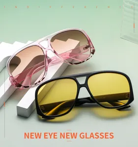 Detail view of stylish oversized pilot sunglasses with low temples, UV protection for all.