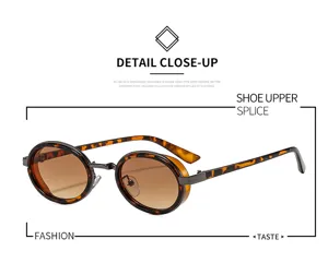Lunettes de soleil ovales style steampunk vintage avec monture en métal et verres dégradés.