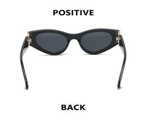 Elegantes gafas de sol estilo cat-eye negras con lentes oscuras y bisagras metálicas.
