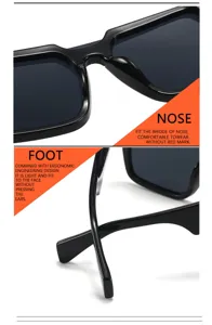 Detailed close-up view of vintage square one-piece large frame sunglasses for stylish unisex look.