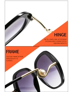 Lunettes de soleil œil-de-chat chic pont perle métal, monture oversize élégante femme.