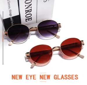 Vue détaillée de lunettes de soleil punk rondes rétro avec monture métallique.