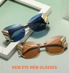Rimless fashion sunglasses for men and women, featuring stylish cut lenses and gold wings.