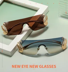 Chic occhiali da sole senza montatura cigno in metallo con lenti sfumate per donne alla moda.