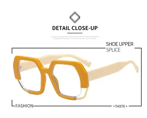 Detailansicht trendiger unregelmässiger Oversize-Blaulichtbrille mit gelbem und weissem Rahmen an.