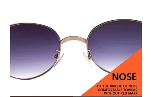 Lunettes de soleil style punk détail, monture métal verres dégradés, protection anti-UV.