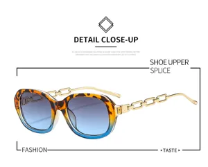 Occhiali da sole quadrati da donna alla moda con eleganti stanghette a catena dorata.