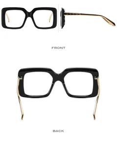 Schicke Oversize-Quadrat-Klarsichtbrille mit schwarzem Gestell und goldenen Metallbügeln.