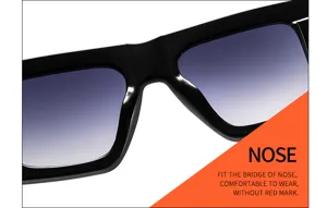 Close-up detail of trendy black thick frame sunglasses with gradient blue lenses and comfortable nose.