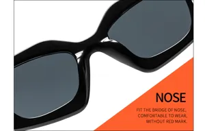 Vue de détail de lunettes de soleil carrées noires, élégantes lunettes pour femmes.