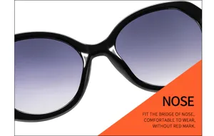 Close-up detail of stylish round frame sunglasses with comfortable nose bridge design.